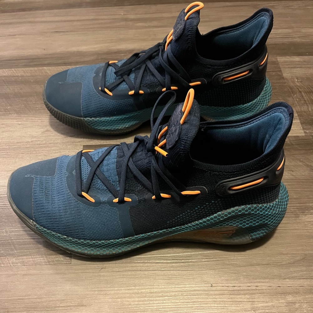 Curry 6 Men’s Blue and Orange Sneakers
